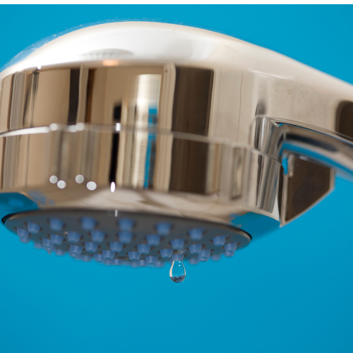 Image of a reliable plumber assessing a home's plumbing issues in Birmingham, showcasing Jack The Plumber services.